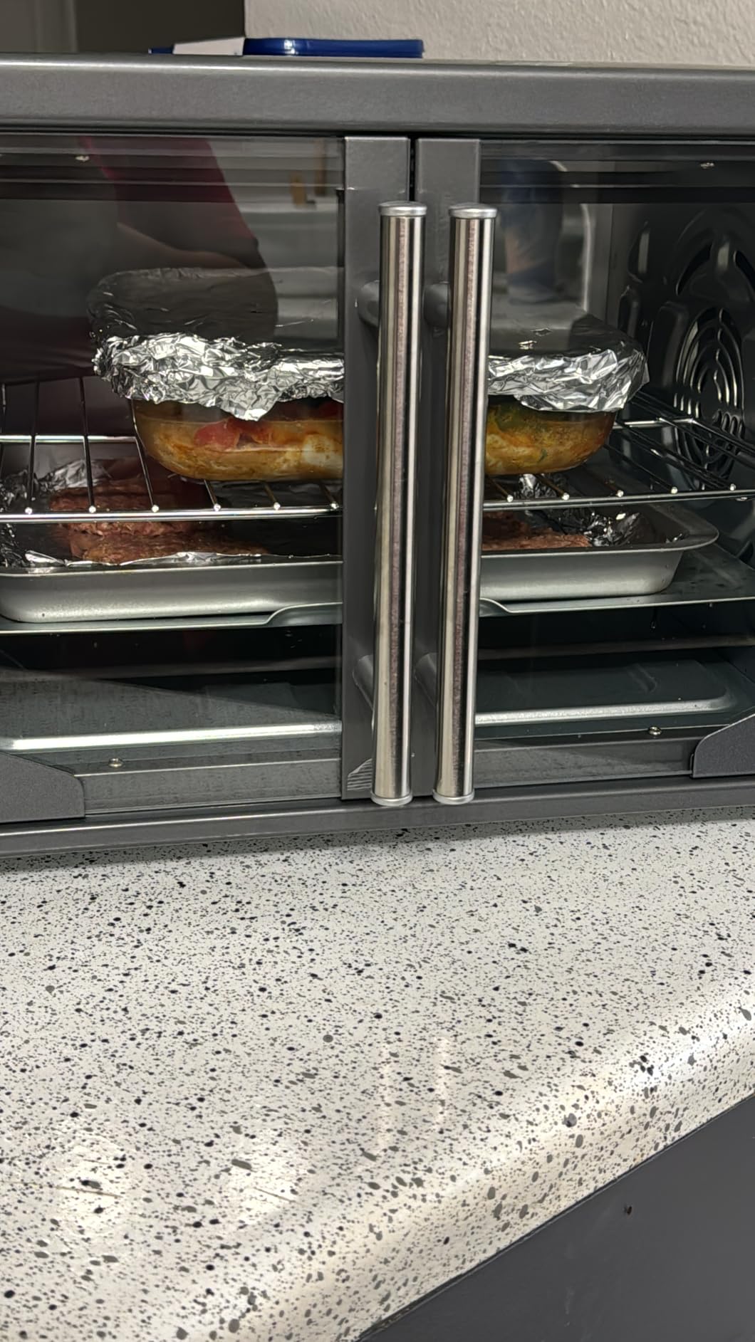 Oster Extra-Large 42L French Door Countertop Toaster Oven, 6-in-1 Air Fryer Oven with Air Fry Rack, Wire Rack, Baking Pan and Crumb Tray, Stainless Steel customer photo 2