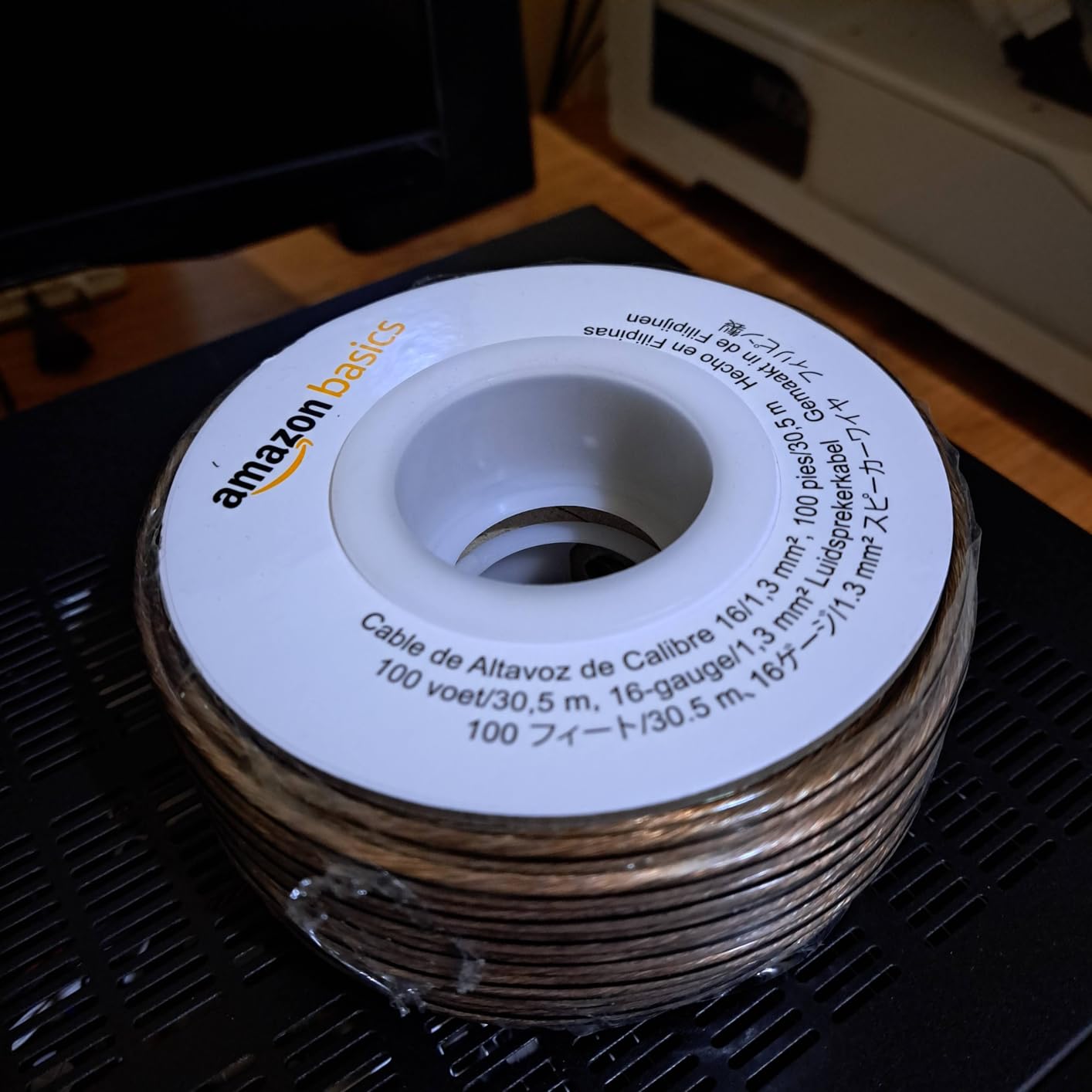 Amazon Basics 16-Gauge Speaker Wire Cable, Polarity Marked, 50 feet, Transparent customer photo 1
