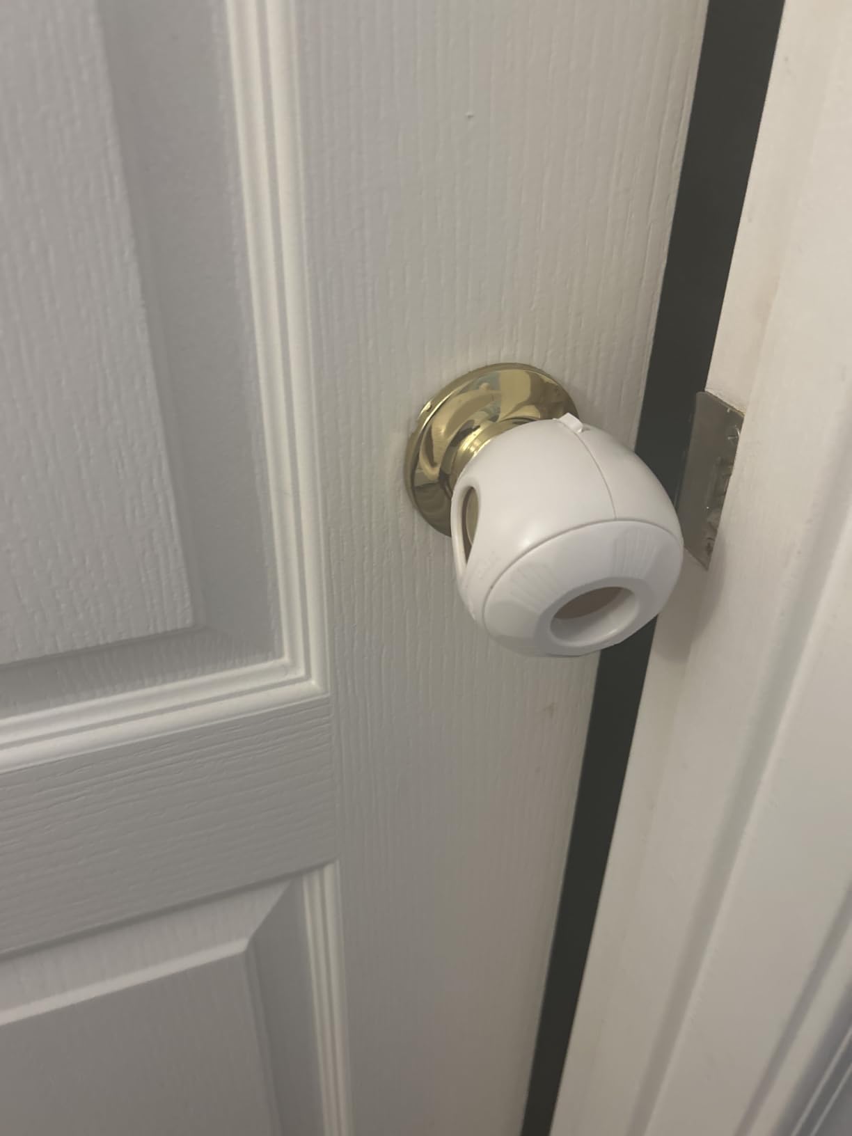 Child Safety Door Knob Cover (4 Pack) Hard-to-Remove Dual-Lock Door Handle Covers for Kids - Reusable Baby Proof Door Knob Locks - Installs Easily, No Tools Needed (White) customer photo 1