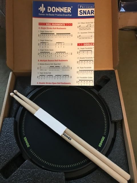 Drum Practice Pad 12 Inches, Donner Quiet Drum Pad with Removable Snare Simulation Built-in 800 Steel Balls, Drum Sticks, 40 Standard Rudiments(Black) customer photo 1
